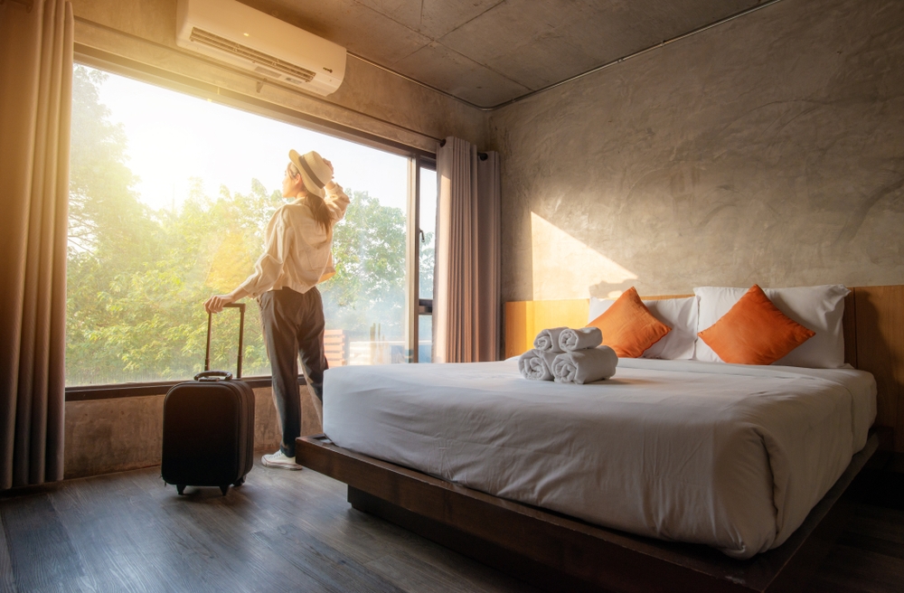 Portrait,Of,Tourist,Woman,Standing,Nearly,Window,,Looking,To,Beautiful