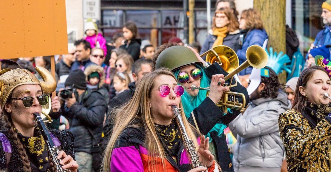 people at a festival with musical instruments